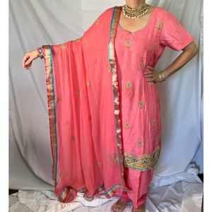 Embroidered Indian Salwar suit in pink peach color